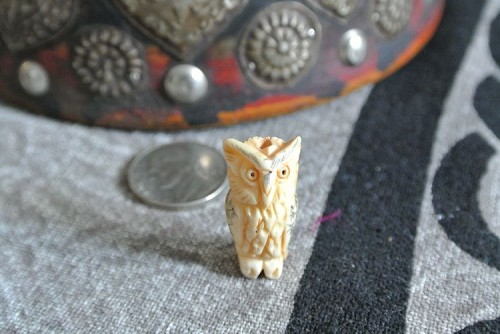 Handcarved bone owl bead with scrimshaw